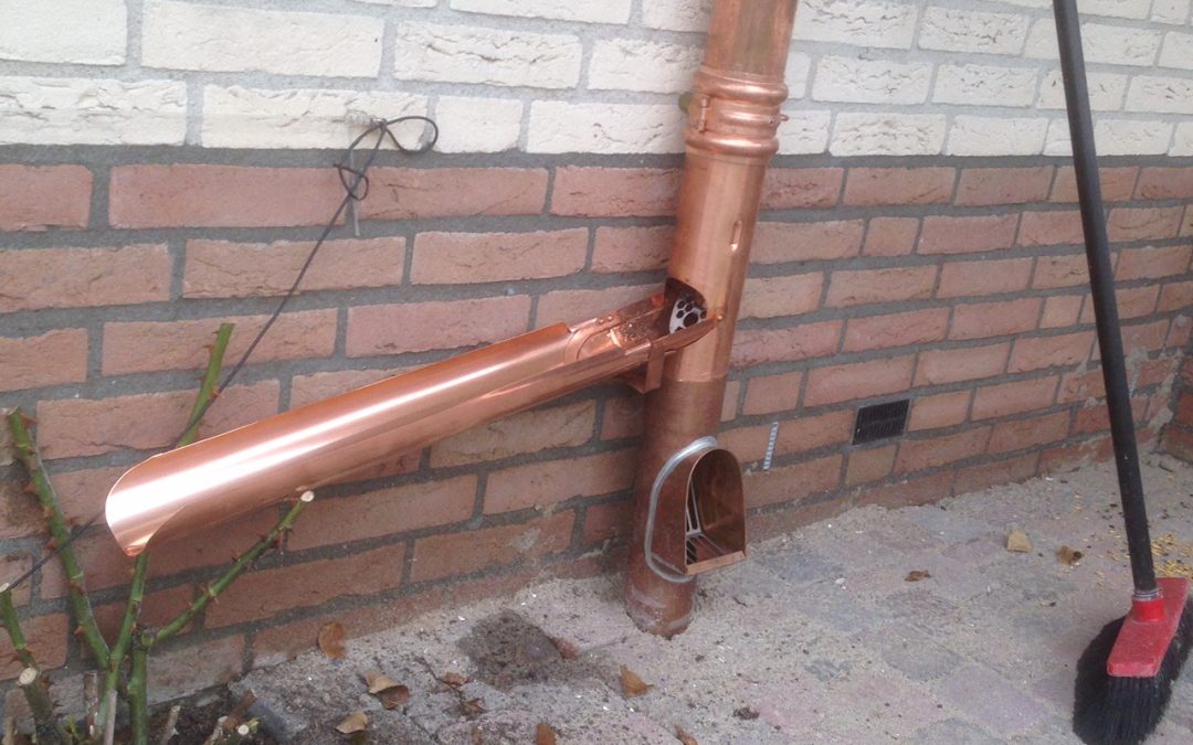 Koperen goten en regenpijpen